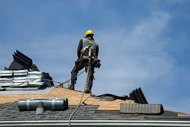Professional Roof Replacement technician working in Kenoza Lake, NY